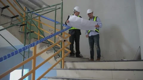 Engineer concept. Business people checking the strength of building structure Stock Footage 143113254