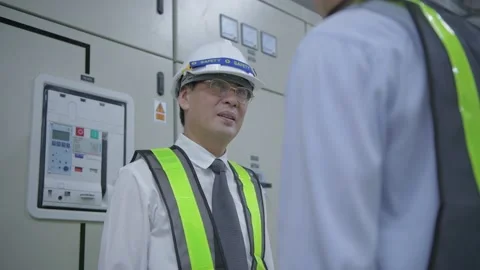 Engineer concept. A colleague shaking hands inside the office. 4k Resolution. Stock Footage 140687817