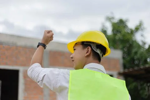 Engineer concept The constructing guy looking at the construction site and ra Stock Photos