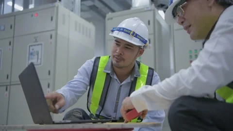 Engineer concept. The employee is checking the generator. 4k Resolution. Stock Footage 141823444