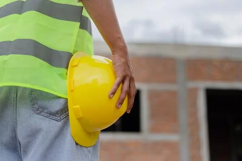 Engineer concept The male constructing staff that wears a white top covered w Stock Photos