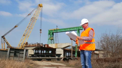 Engineer of a construction company with documents Stock Footage 87423634