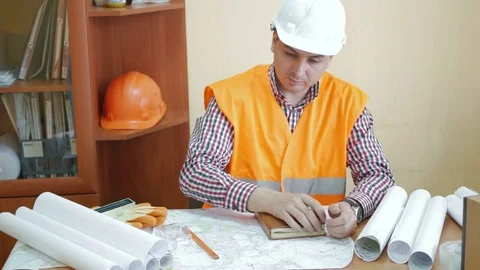 Engineer construction company works with projects Stock Footage 72822730
