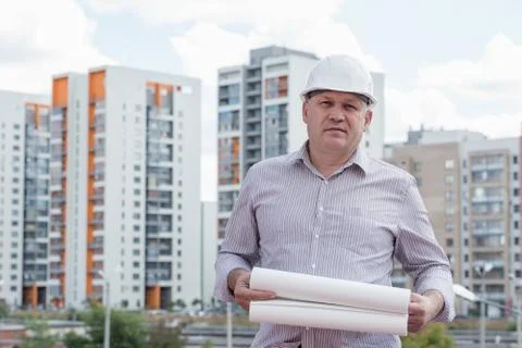 An engineer with construction plans Fotos de archivo