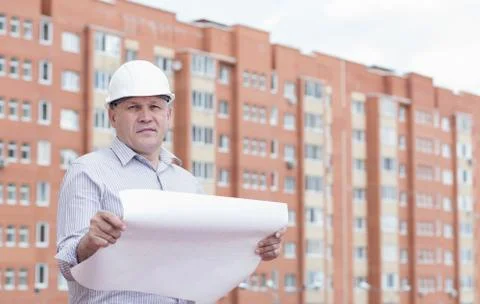 An engineer with construction plans Stock Photos