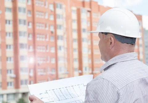 An engineer with construction plans 스톡 사진