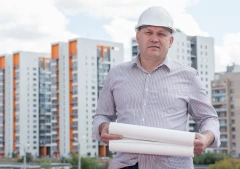 An engineer with construction plans Stock Photos