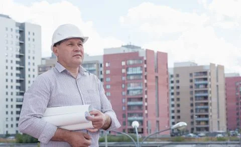 An engineer with construction plans Stock Photos