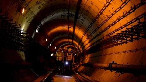 Engineer construction subway maintenance worker in safety vest, hard hats Stock Footage 347671040