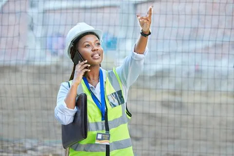 Engineer, construction worker or maintenance and development woman on a phone Stock Photos