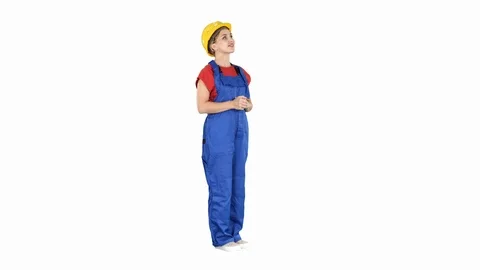 Engineer construction worker woman looking up at a building or statistics or Vídeos de archivo 104778339