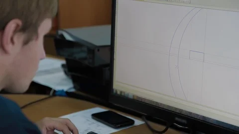 Engineer, Constructor, Designer in Glasses Working on a Personal Computer. He Stock Footage 127559182