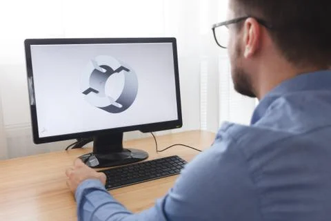 Engineer, Constructor, Designer in Glasses Working on a Personal Computer. He Stock Photos