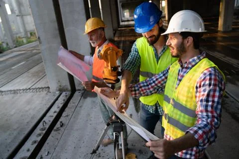 Engineer, contractor, architect teamwork. Construction people talking and Stock-Fotos