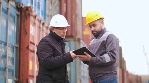Engineer control loading Container on delivery truck in container yard area to Stock Footage 306216341