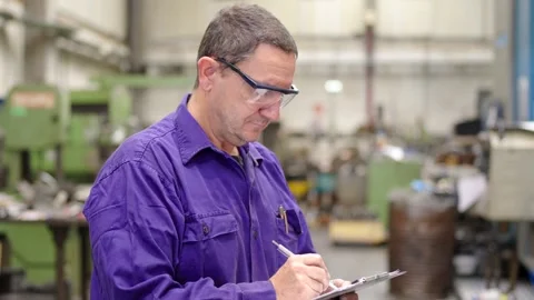 Engineer controlling industrial process in the factory Stock-Footage 259241135