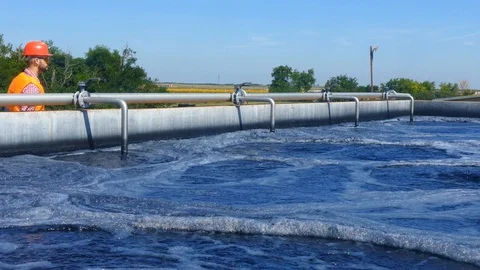 An engineer controlling a quality of water Stock Footage 125081009