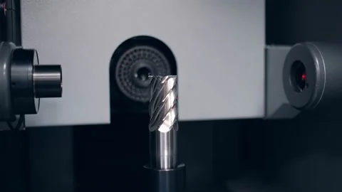 Engineer Controls Detail Quality under Microscope. Quality control of drill Stock Footage 171775231