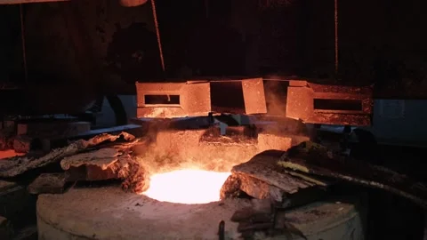 The engineer controls the operation of furnaces for melting metal. Heat Stock Footage 172014431