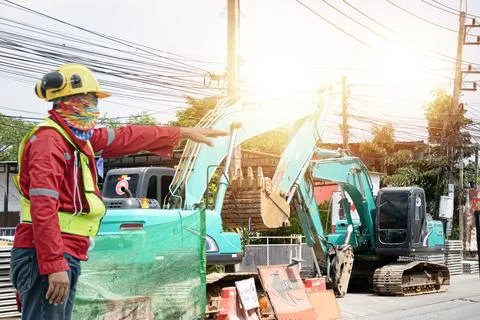 Engineer controls the operation of machinery Stock Photos
