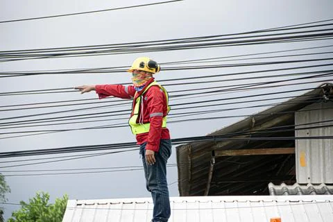 Engineer controls the operation of machinery Stock Photos
