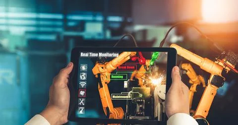 Engineer controls robotic arms by augmented reality industry technology 스톡 사진