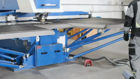 Engineer controls the technological process of the robotic machine Stock Footage 88588466