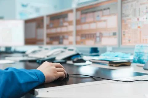 The engineer controls the work of the technological process of energy generat 스톡 사진