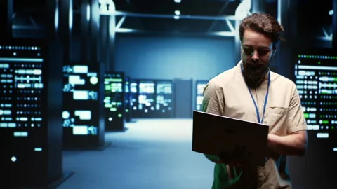 Engineer in cryptocurrency server farm Stock Footage 247092798