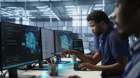 Engineer in data center implementing advanced AI systems 스톡 사진