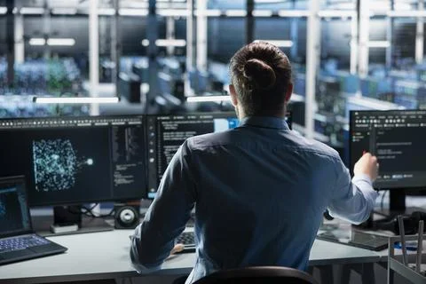 Engineer in data center using AI LLM assistant to perform maintenance Stock Photos