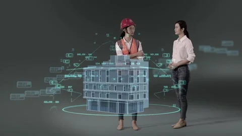 Engineer &amp; designer discussing before BIM model in virtual world Stock Footage 131633672