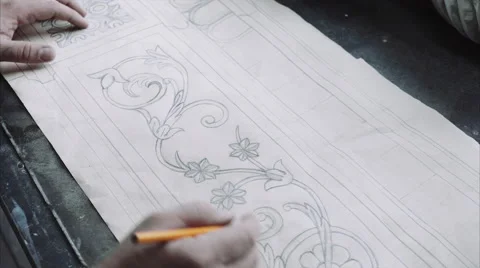 Engineer designer drawing technology sketch on a table Stock Footage 68075374