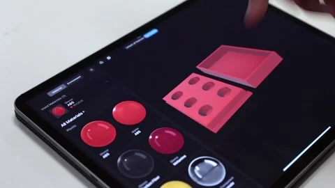 Engineer designing a 3 dimensional object on tablet Stock Footage 205196199