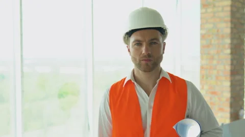 Engineer developer in helmet inspecting building. Builder constructor specialist Stock Footage 201288982