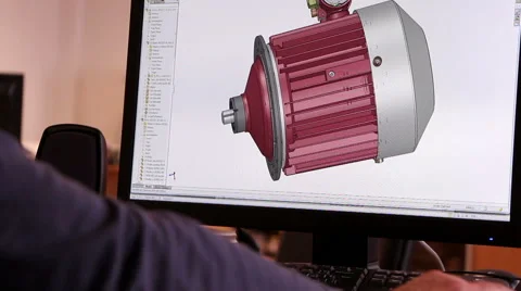An engineer developing 3D model of electric motor in an electric motor plant. Stock Footage