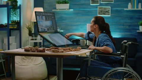 Engineer with disability using touch scr... | Stock Video | Pond5