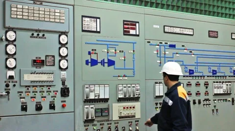 Engineer Disables Alarms On Main Panel Stockbeeldmateriaal 10790500