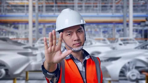 Engineer Disapproving With No Hand Sign In Car Factory Stock Footage 331577608