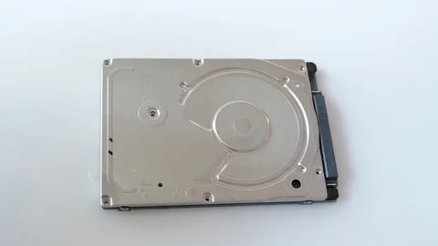 Engineer is disassembling broken hard disk drive for data recovery Stock Footage 72930470