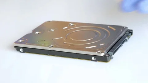 Engineer is disassembling broken hard disk drive for data recovery 動画素材 72931409