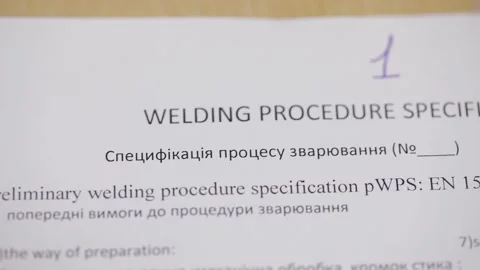 Engineer discussing work with laptop computer at logistics center warehouse Stock Footage 142876447