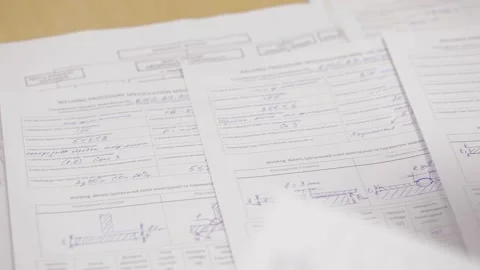 Engineer discussing work with laptop computer at logistics center warehouse Stock Footage 142891404