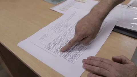 Engineer discussing work with laptop computer at logistics center warehouse Stock Footage 142897165