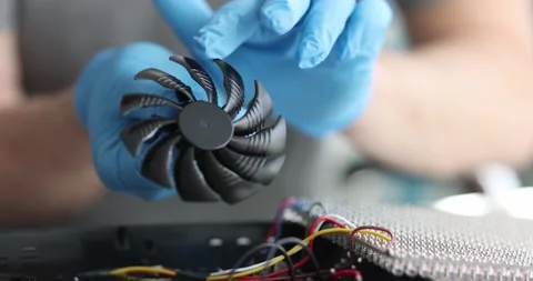 Engineer dismantle cooler cooling fan remove dusty parts Stock Footage 281418186