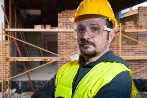 Engineer Do it yourself, man dressed in yellow builder helmet with protective Stock Photos