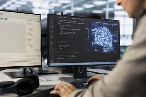 Engineer doing data center automation using AI and machine learning tools Stock Photos