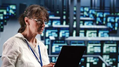 Engineer doing regular server upgrades Stock Photos