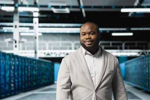 Engineer doing yearly checkup to prolong data center hardware life span Stock Photos
