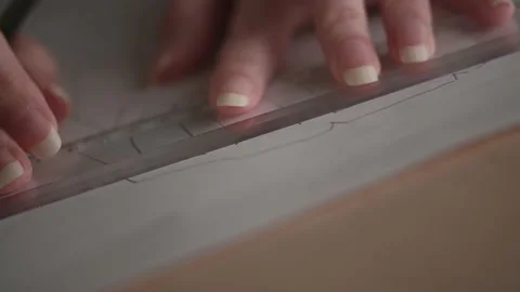 Engineer draw with a slate pencil on a piece of paper. Stock Footage 146123749